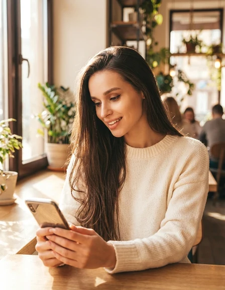 She smiles at his first message in the app